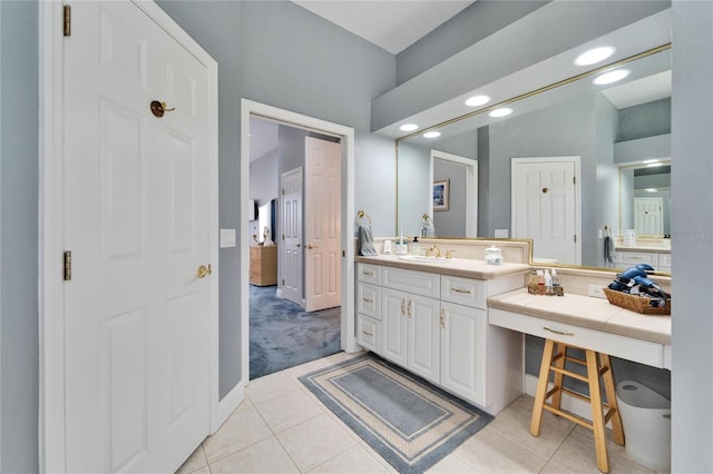 bathroom featuring vanity and tile patterned flooring