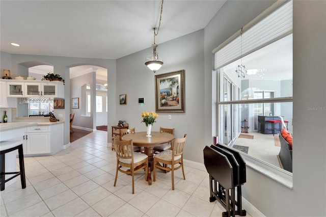 dining space with light tile patterned flooring