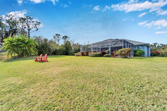 view of yard with a lanai