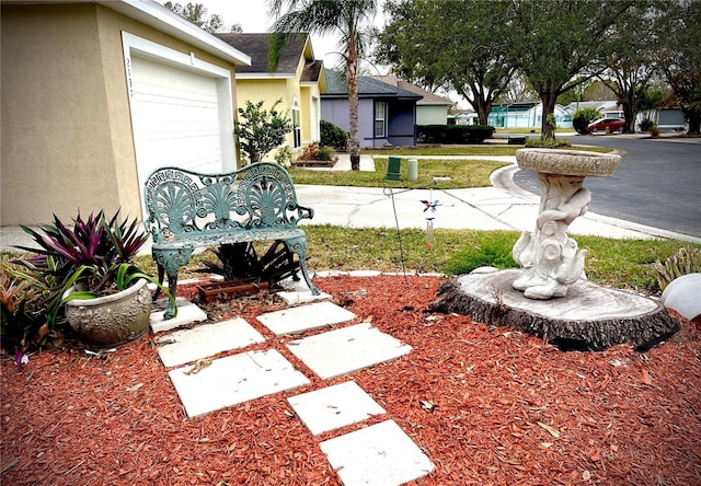 view of yard featuring a garage