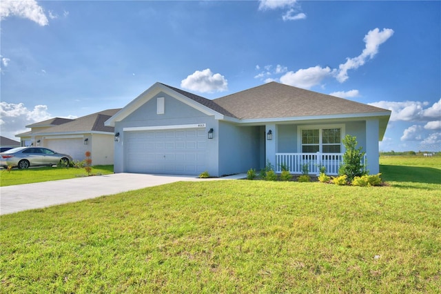 ranch-style house featuring a front yard, covered porch, and a garage