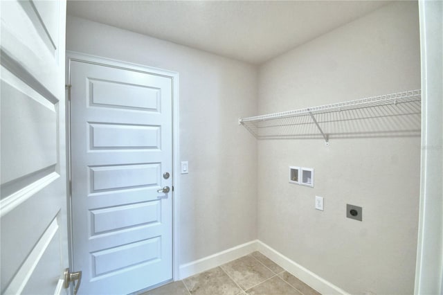 laundry room with light tile patterned floors, washer hookup, and hookup for an electric dryer