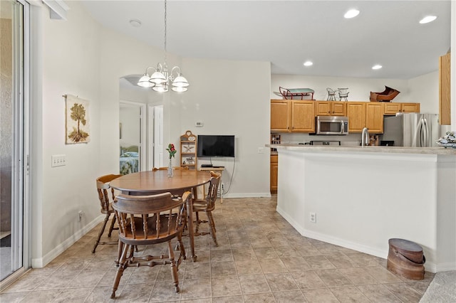 dining room with a chandelier