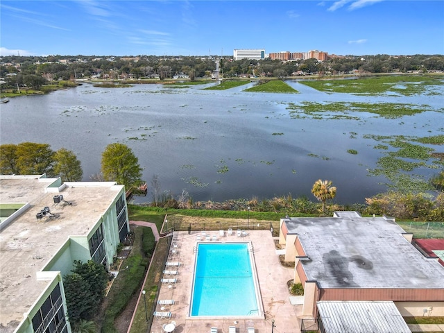 birds eye view of property with a water view