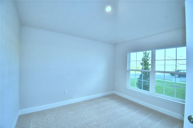 empty room with carpet flooring