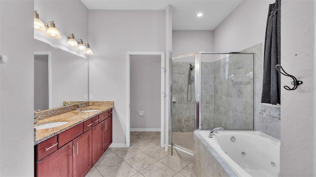 bathroom with vanity, tile patterned flooring, and plus walk in shower