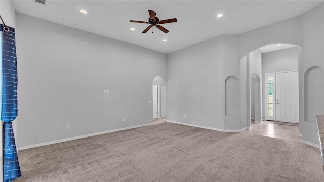 212 Kissengen Park Dr, Bartow, FL 33830 - unfurnished room featuring arched walkways, carpet, ceiling fan, recessed lighting, and baseboards