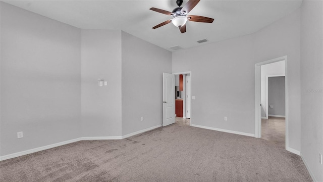 212 Kissengen Park Dr, Bartow, FL 33830 - empty room featuring a ceiling fan, light carpet, and baseboards