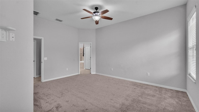212 Kissengen Park Dr, Bartow, FL 33830 - unfurnished bedroom featuring carpet, multiple windows, and baseboards