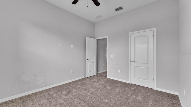212 Kissengen Park Dr, Bartow, FL 33830 - unfurnished bedroom with carpet, baseboards, and ceiling fan