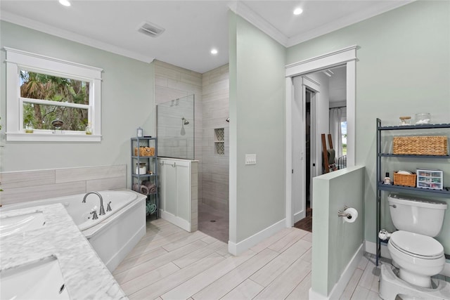 full bathroom with toilet, vanity, crown molding, and shower with separate bathtub