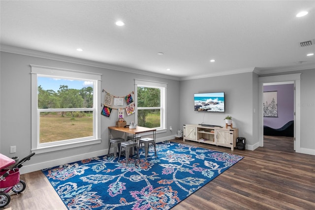 interior space featuring dark wood-type flooring and crown molding