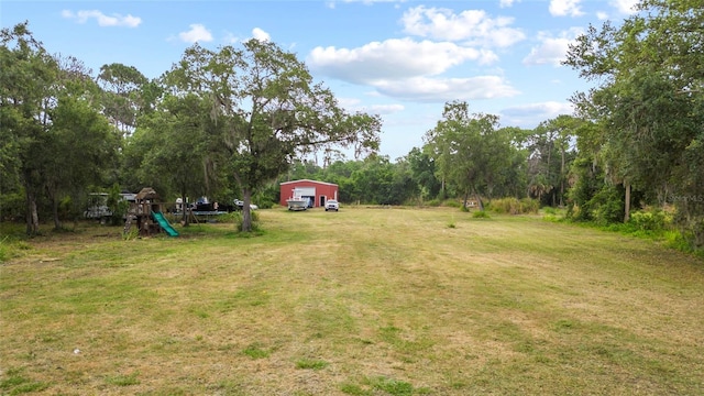 view of yard with a playground