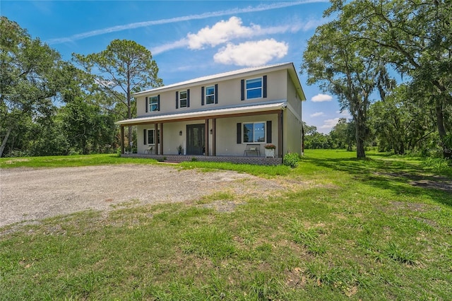 view of front of property with a front lawn and a porch