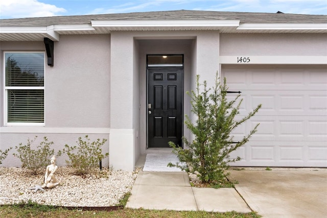 property entrance featuring a garage