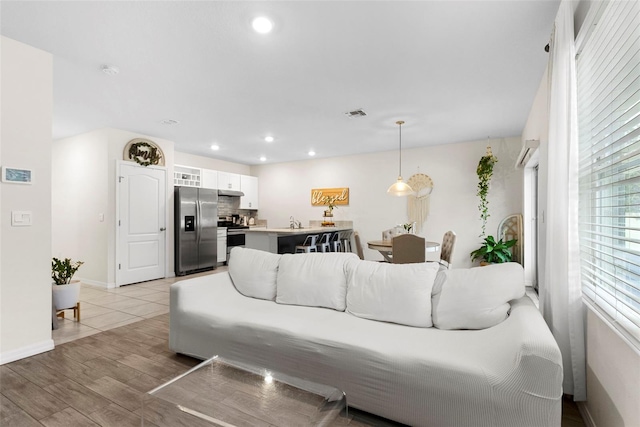 living room featuring sink