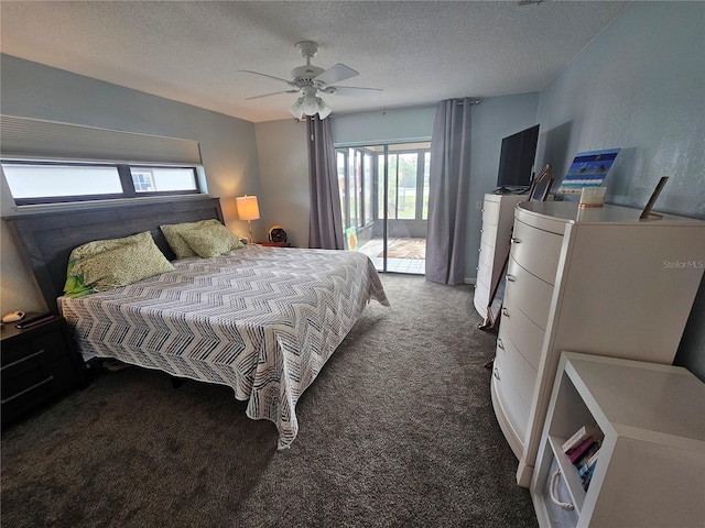 bedroom with ceiling fan, access to exterior, a textured ceiling, and dark colored carpet