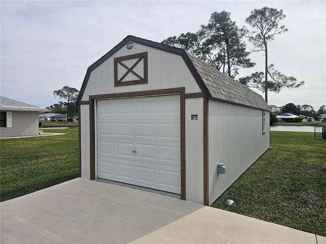 garage with a lawn