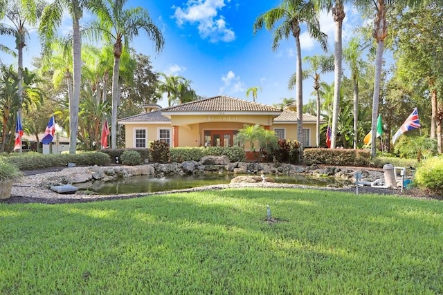 exterior space with a front yard