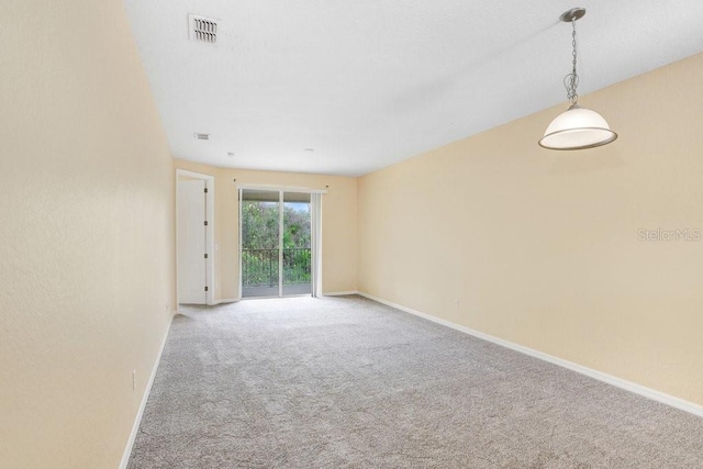 unfurnished room with carpet floors