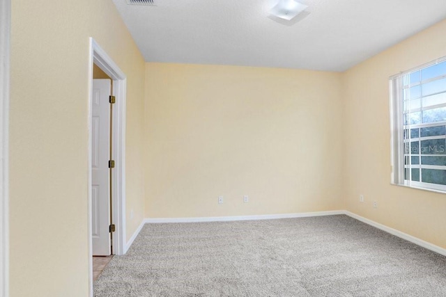 view of carpeted spare room