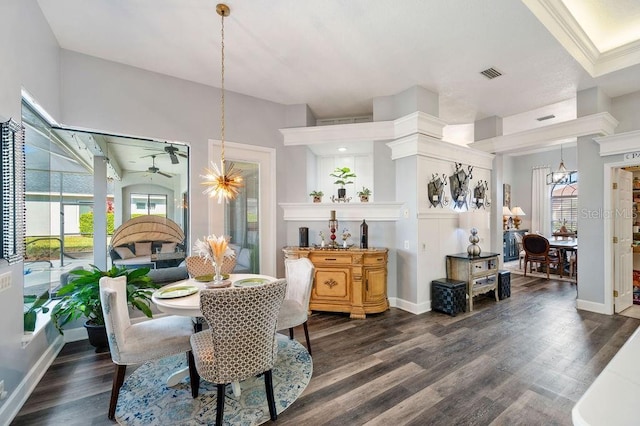 dining room with dark hardwood / wood-style flooring