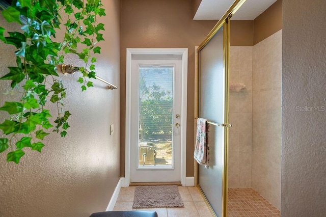 entryway featuring light tile patterned floors