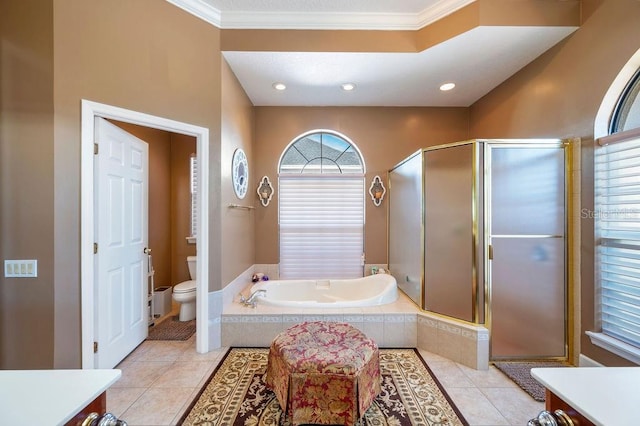 full bathroom with vanity, toilet, independent shower and bath, and tile patterned flooring