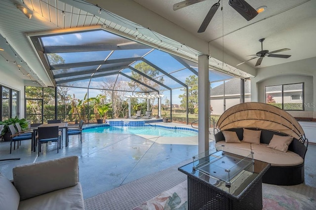 view of swimming pool with a lanai, an outdoor hangout area, and a patio area