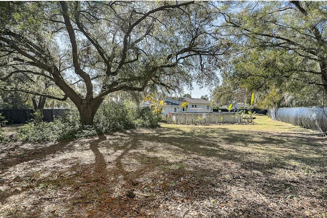 view of yard featuring a pool