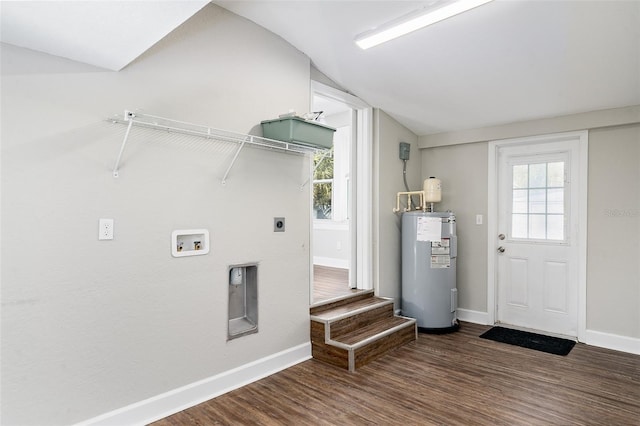 clothes washing area with electric dryer hookup, electric water heater, washer hookup, and dark hardwood / wood-style flooring