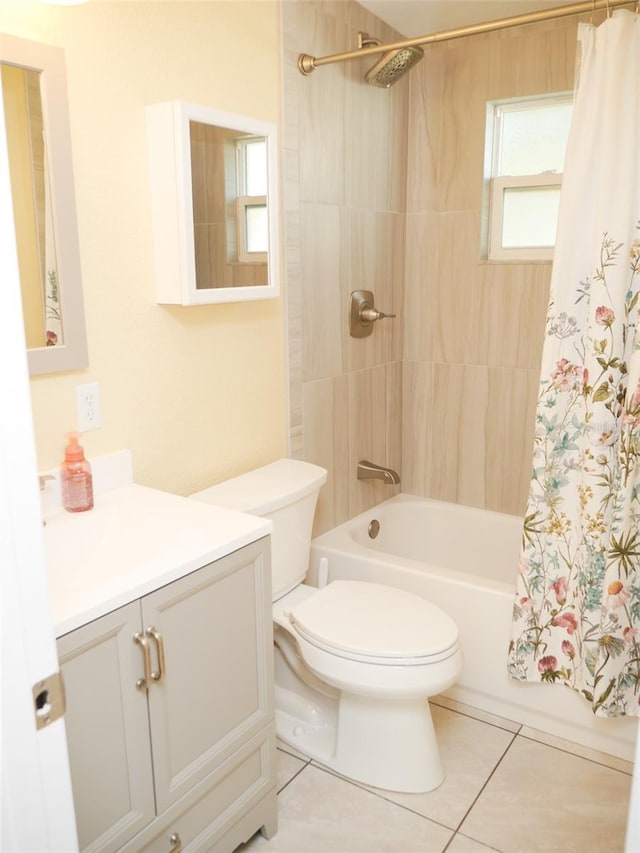 full bathroom with vanity, shower / tub combo, tile patterned floors, and toilet