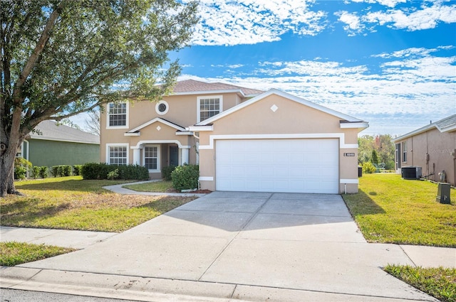 traditional-style house with central AC, an attached garage, concrete driveway, a front lawn, and stucco siding