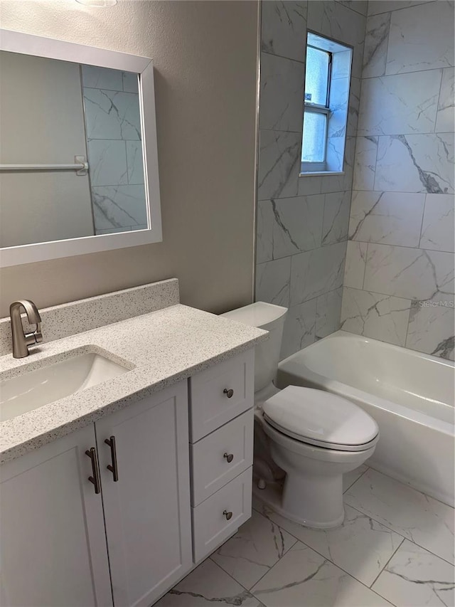 full bathroom with toilet, vanity, and tiled shower / bath combo