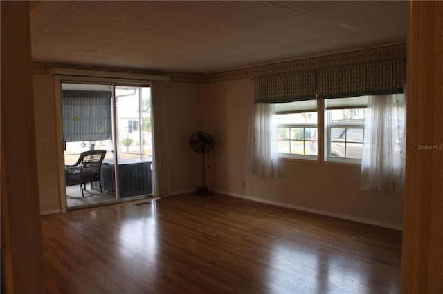 unfurnished room featuring hardwood / wood-style floors