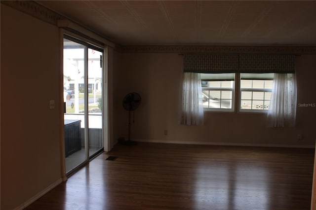 empty room featuring hardwood / wood-style flooring