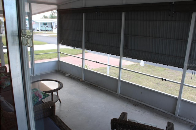 unfurnished sunroom with a healthy amount of sunlight