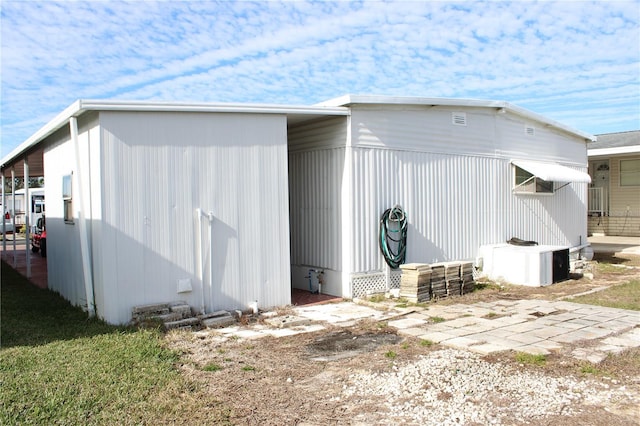 view of outdoor structure with ac unit