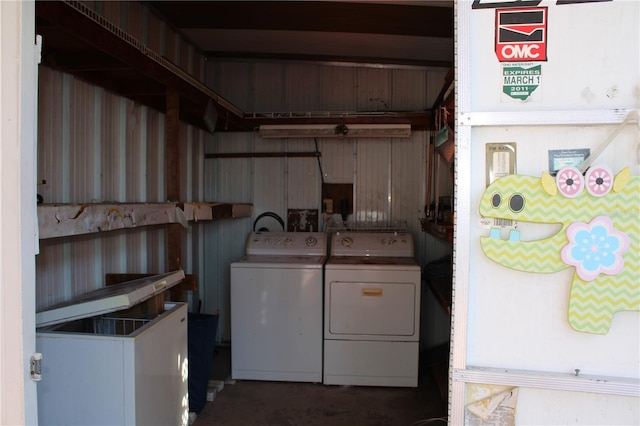 washroom with washer and dryer