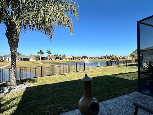 view of yard with a water view