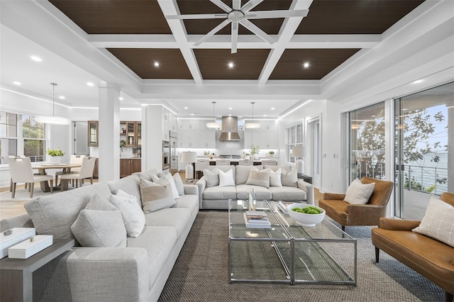 living room with decorative columns, wooden ceiling, beam ceiling, and coffered ceiling