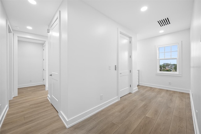 hallway featuring light hardwood / wood-style flooring