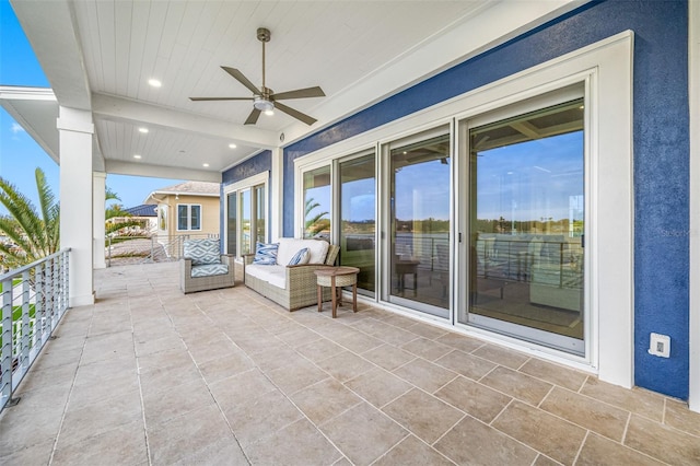 view of patio / terrace featuring ceiling fan