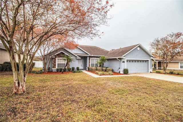 single story home with a garage and a front yard