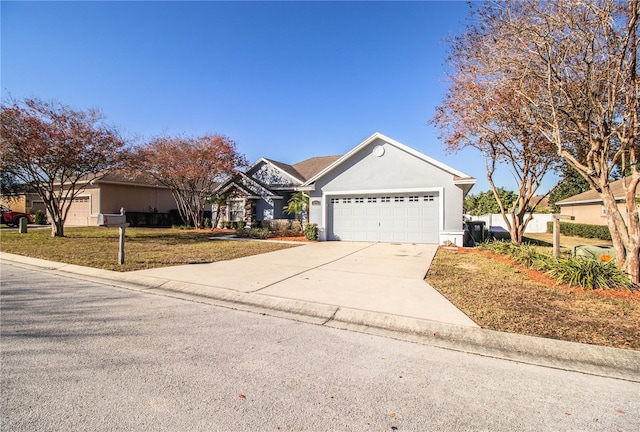 ranch-style home with a garage and a front yard