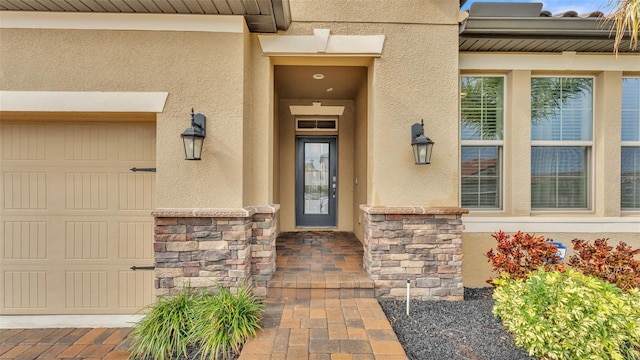 doorway to property featuring a garage