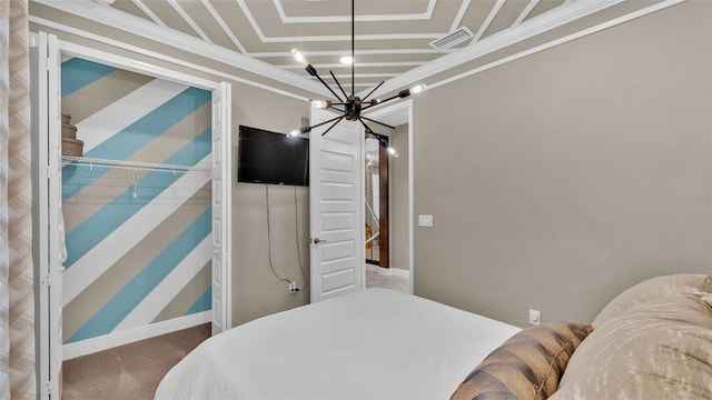 carpeted bedroom featuring an inviting chandelier and ornamental molding