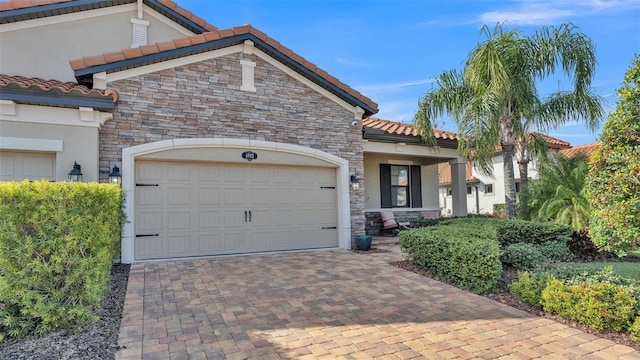 view of front of property featuring a garage