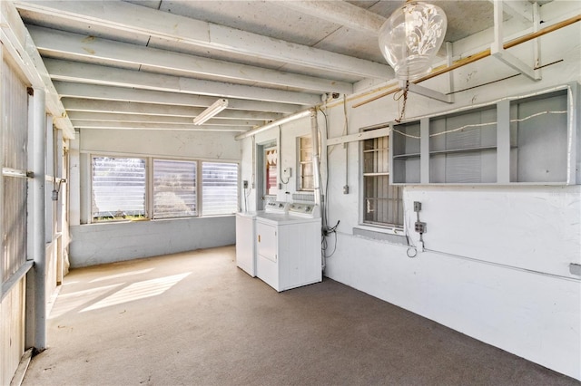 basement with washing machine and clothes dryer