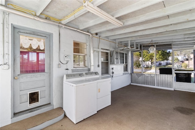 washroom featuring washing machine and clothes dryer